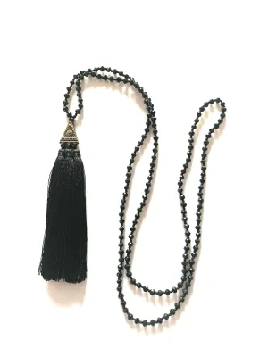 Black beaded necklace with tassel